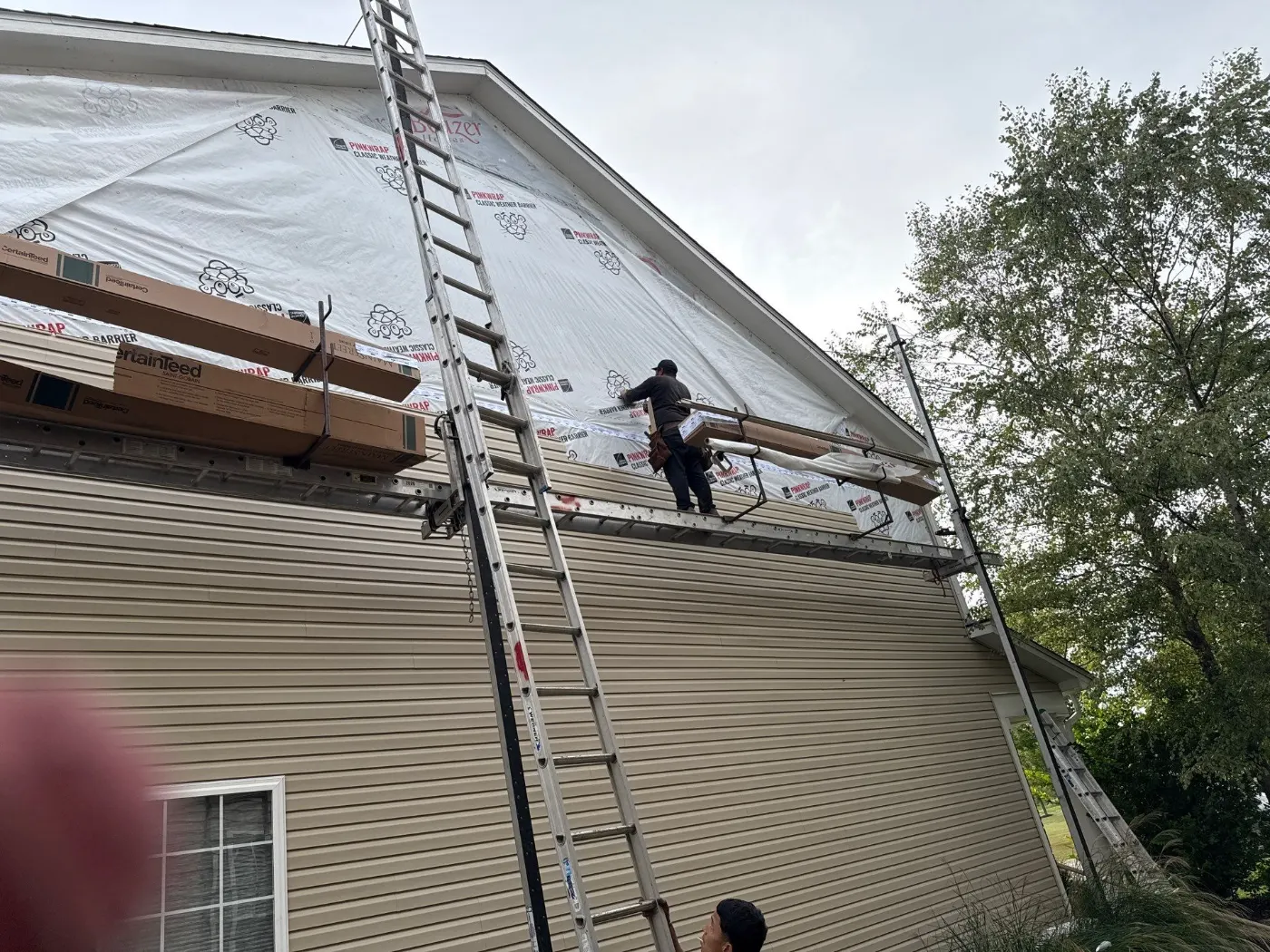 Siding installation documented in Featherstone